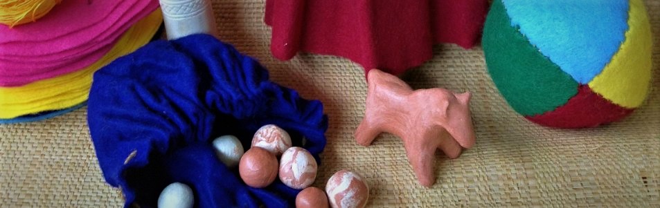 handmade medieval toys marbles clay horse and felt ball